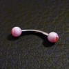 Piercing arcade blanc et rouge