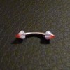 Piercing arcade blanc et rouge