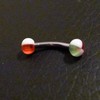 Piercing arcade blanc, rouge et vert