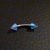 Piercing arcade bleu