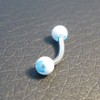 Piercing arcade bleu et blanc motif : fleur