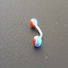 Piercing arcade rouge et bleu Ying Yang