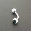 Piercing arcade noir blanc vert motif : feuille