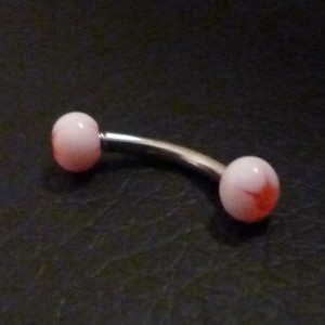 Piercing arcade orange et blanc