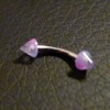 Piercing arcade violet et rose
