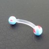 Piercing arcade bleu, rouge et blanc