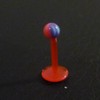 Piercing labret rouge et bleu
