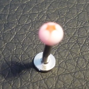 Piercing labret orange et blanc