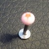 Piercing labret orange et blanc