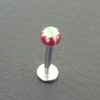 Piercing labret marron, vert et blanc