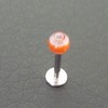 Piercing labret orange, blanc et gris