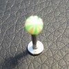 Piercing labret orange et vert