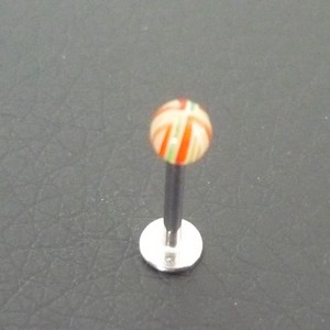 Piercing labret orange et vert