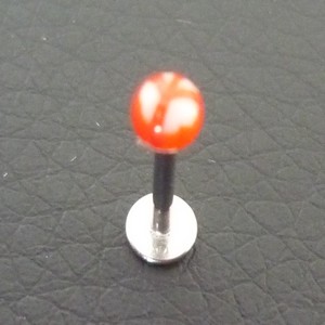 Piercing labret rouge et blanc