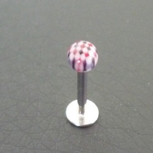 Piercing labret noir, rouge et blanc