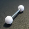 Piercing langue blanc