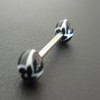 Piercing langue noir et blanc motif: fleur