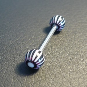 Piercing langue noir et blanc