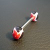 Piercing langue rouge et noir fleur