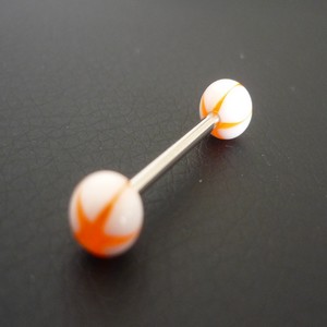 Piercing langue orange et blanc motif étoile