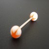 Piercing langue orange et blanc motif étoile