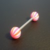 Piercing langue rose, orange et blanc