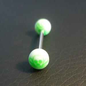 Piercing langue vert et blanc tête de mort