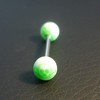 Piercing langue vert et blanc tête de mort