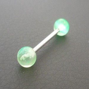 Piercing langue vert