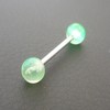 Piercing langue vert