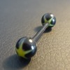 Piercing langue noir et jaune