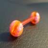 Piercing langue rose et orange