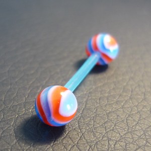 Piercing langue rouge, bleu et blanc