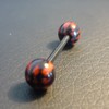 Piercing langue rouge et noir