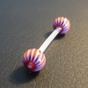 Piercing langue orange et violet