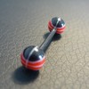 Piercing langue rouge et noir