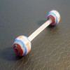Piercing langue bleu et orange