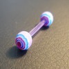 Piercing langue rose et bleu