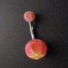 Piercing nombril rose et jaune