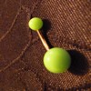Piercing nombril vert
