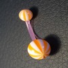 Piercing nombril orange et blanc