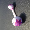 Piercing nombril violet et blanc